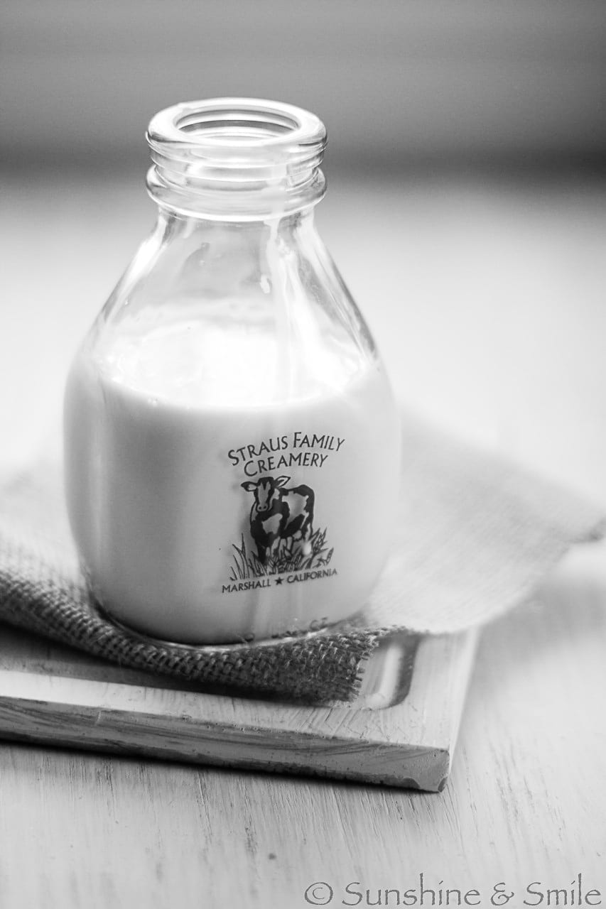 black and white photo of straus family creamery bottle