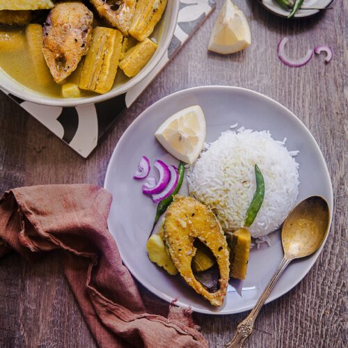 Ilish Maach Kacha Kola Jhol - A Bengali style fish curry with plantain and potato. Very mild and not spicy #bengali #fishcurry #Ilish #maach #indian #plantain #jhol