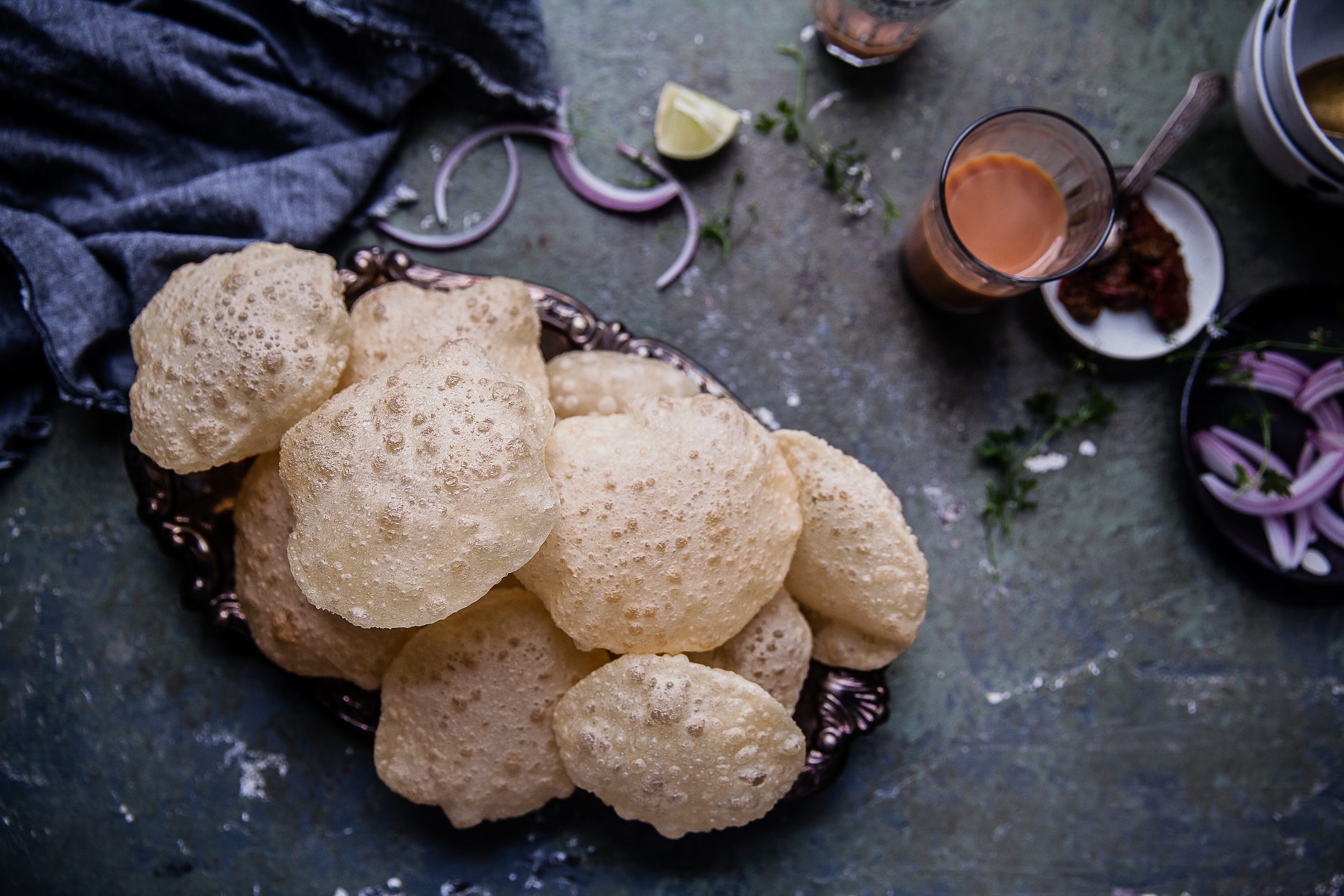 Bengali Luchi | Poori | Deep Fried Indian Flatbread #indian #bread #deepfried #poori #luchi #breakfast #recipe #foodphotography | Playful Cooking