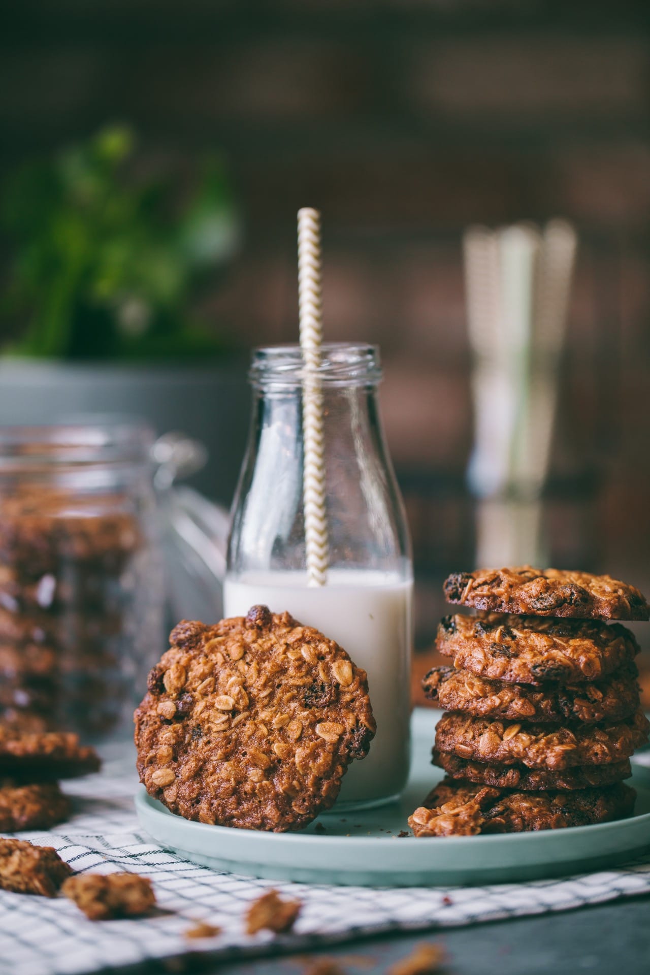 EASY Oatmeal Raisin Cookies with a bottle of milk