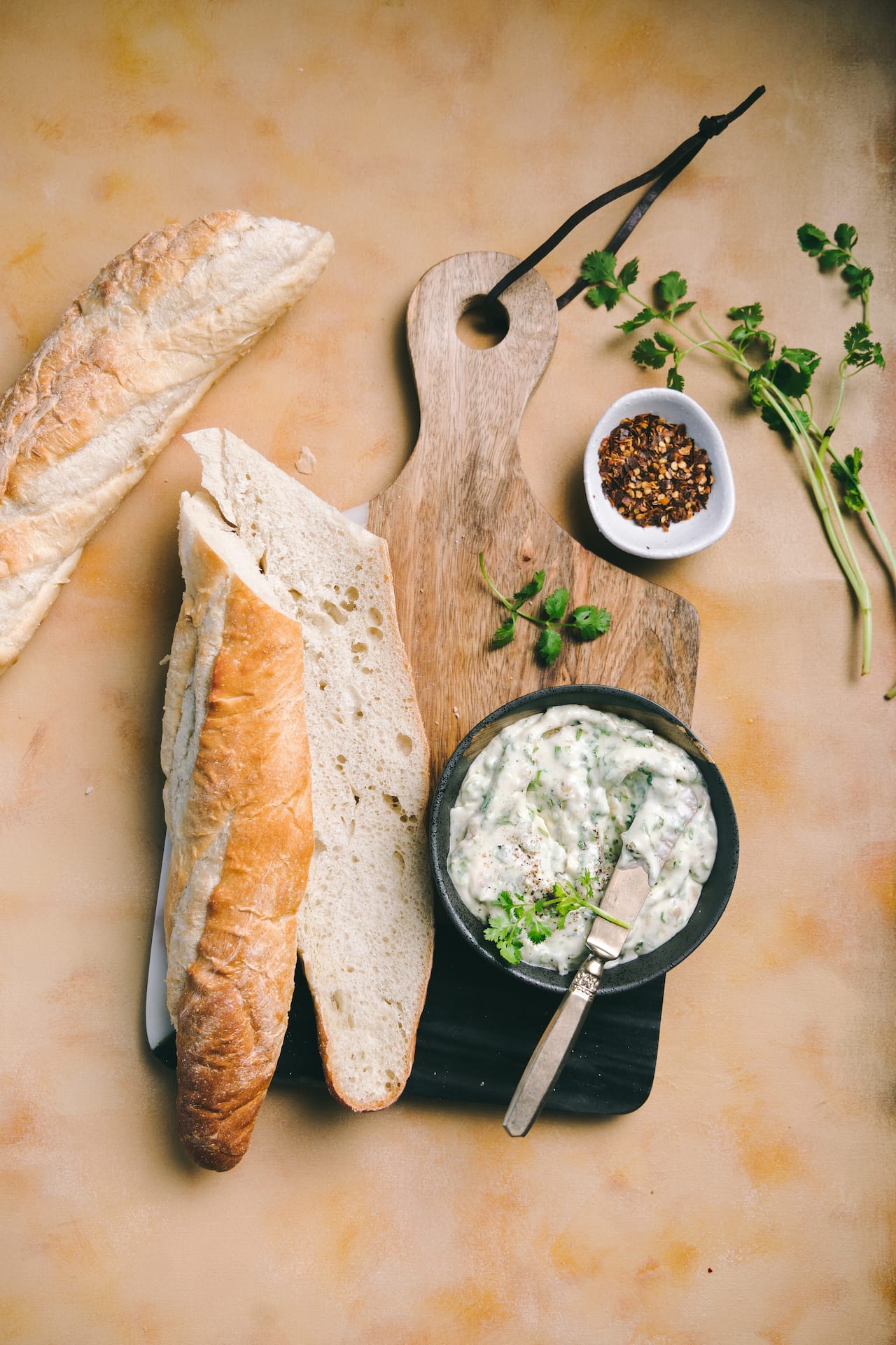 Softened butter with roasted garlic and fresh herb 