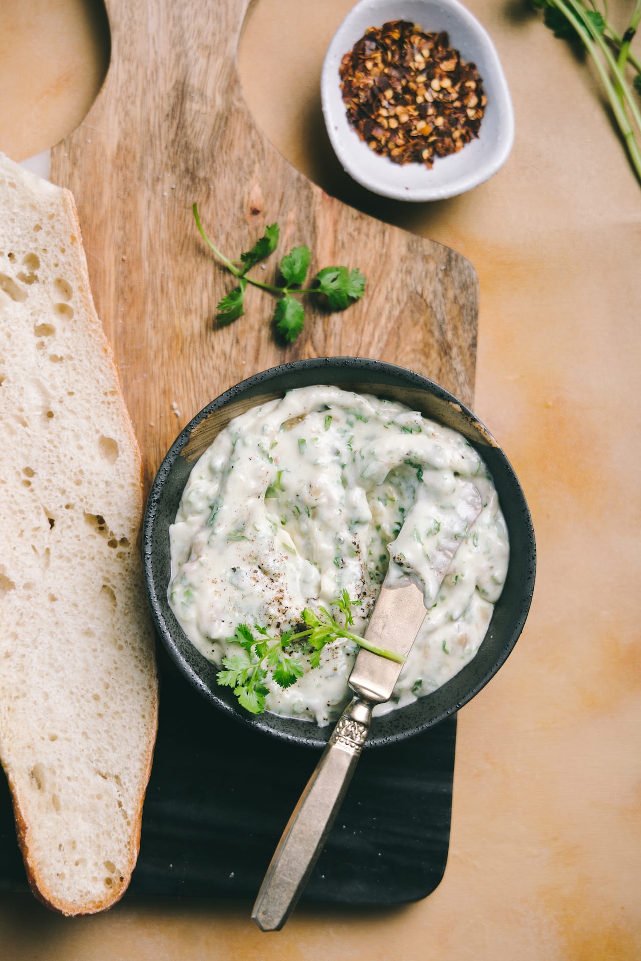 Softened butter with roasted garlic and fresh herb 