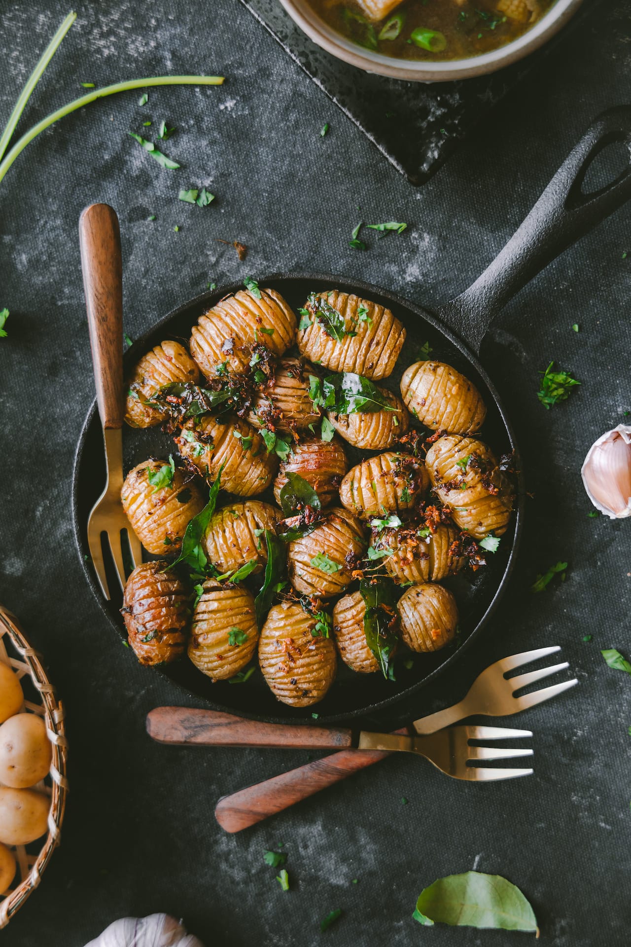 Hassleback Baby Potatoes with curry leaves and garlic